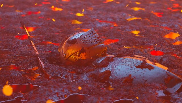 A medieval knight killed in fire. Hero remains left on a battlefield mud. 4KHD