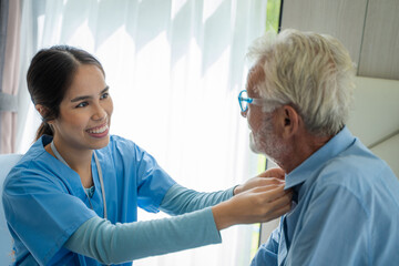 Nurse take care elderly man,Nurse talk support male senior patient,Healthcare concept.
