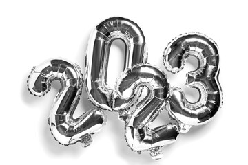 2023 numbers made from foil  balloons. New year concept. Top view. Isolated in white