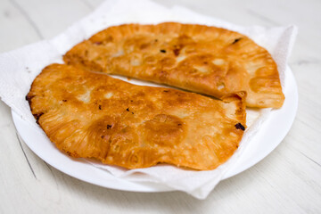 Chicken and onion pies. Fried chicken pies.