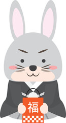 福袋を持って嬉しそうな着物のうさぎの男の子