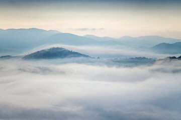Obraz na płótnie Canvas autumn scenery,morning foggy landscape in northeastern Bosnia