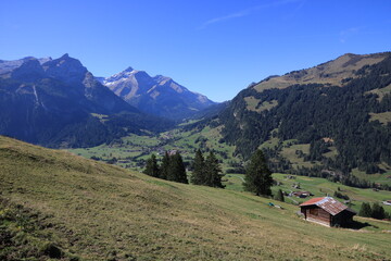 Obraz na płótnie Canvas Village Gsteig Bei Gstaad and high mountains.