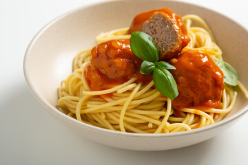 Close up of tasty spaghetti with meat balls tomato sauce selective focus food