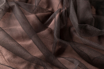 Fashionable brown tulle cloth, sofisticate textile close up view