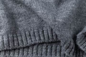 Woolen grey cloth, ondulate textile close up view