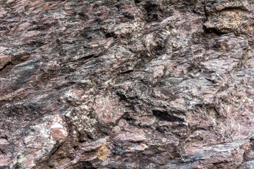 Stone texture in an old marble quarry near the village of Peteny