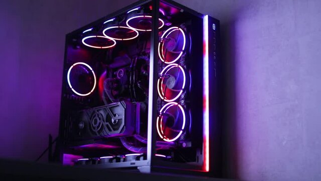 Gaming pc glowing in the dark - The system unit of a modern gaming computer
