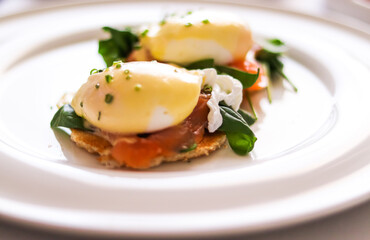 Luxury breakfast, brunch and food recipe, poached eggs with salmon and greens on gluten-free toast...