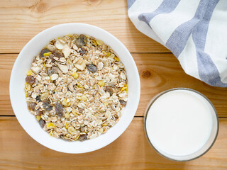 A Bowl of muesli breakfast and rolled oats with dried fruits