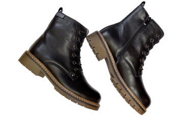 Autumn and winter women's black ankle boots isolated on a background.