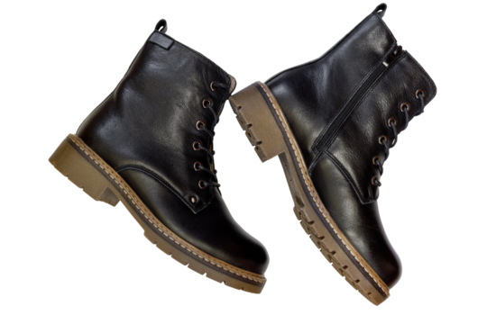 Autumn and winter women's black ankle boots isolated on a background.