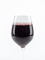 A glass of wine on a white background.
