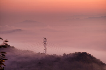 A pylon under the morning fog
