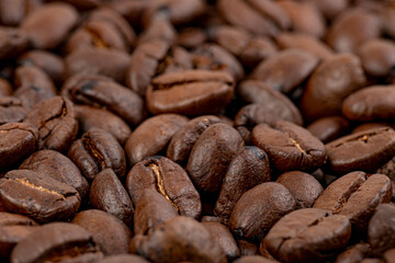 Coffee beans. Roasted coffee beans, can be used as background. Fragrant Arabica coffee.