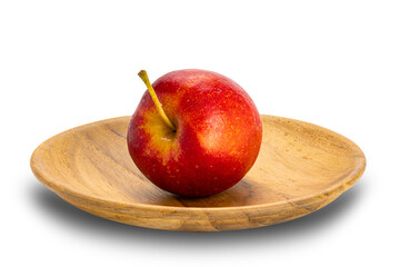 Side view of single fresh ripe crisp snack-size mini apple or little apple or small apple in wooden...