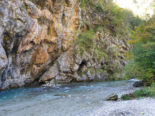 clean water of Savinja river - between rocks in autumn Slovenia