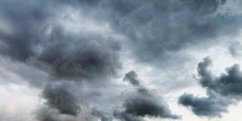 Fototapeta na wymiar Danger dusk clouds full storm sky before to be raining. Dramatic sky background.