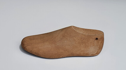 Old wooden shoe shape used by shoemakers in the manufacture of adult and children's shoes. Modeling.