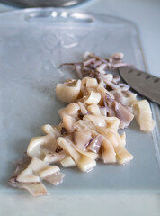 Fresh baby squids, an ingredient for a dish.