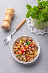 Overnight soaked legume salad of chickpea-kidney beans and other raw veggies mixed with herbs and mild spices