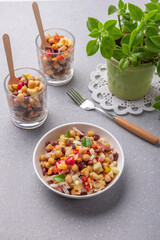 Overnight soaked legume salad of chickpea-kidney beans and other raw veggies mixed with herbs and mild spices