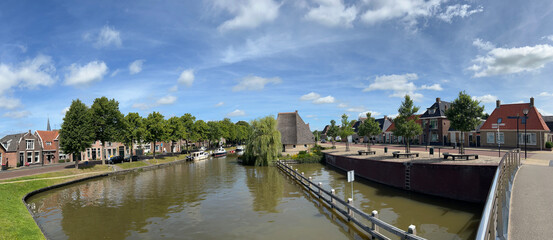 Obraz premium Panorama from a canal and the architecture in the old city of Franeker