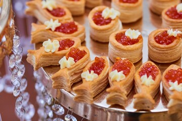 Delicious fish caviar canapes. Seafood in the diet. Decoration of the festive table.