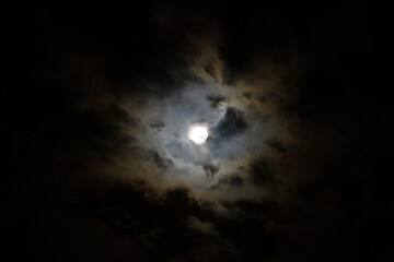 Naklejka na ściany i meble Full Moon in the night sky with clouds