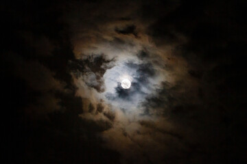 Obraz na płótnie Canvas Moon in the night sky with clouds