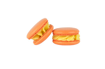 two orange homemade macarons