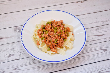 Pasta with tomato sauce and meat.  Italian pasta Bolognese
