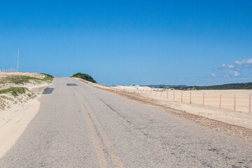 street in the middle of the dunes desert in Genipabu