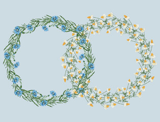 Decorative floral rings from drawn cornflowers and chamomile wildflowers