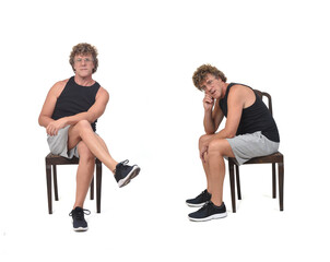 Fototapeta na wymiar side and front view of same man with sportswear sitting on chair on white background