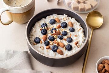 Oatmeal with blueberries, almonds and honey. Healthy food. Vegetarian food. Breakfast.