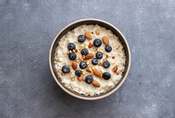 Oatmeal with blueberries, almonds and honey. Healthy food. Vegetarian food. Breakfast.