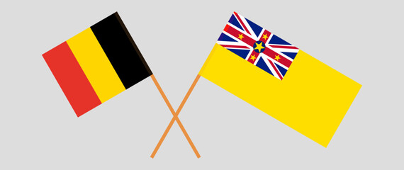 Crossed flags of Belgium and Niue. Official colors. Correct proportion