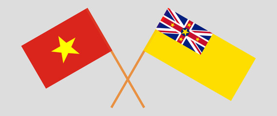 Crossed flags of Vietnam and Niue. Official colors. Correct proportion