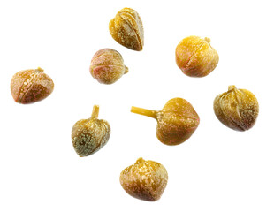 Individual capers isolated on white background. Full clipping path.