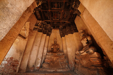 Ruins of pagodas and monks in Wat Khai Watthanaram, Ayutthaya, Thailand that were destroyed by...