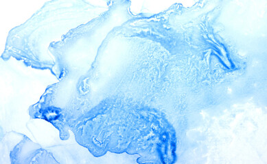 Gentle blue alcohol ink abstract background, wavy stains of watercolor paint