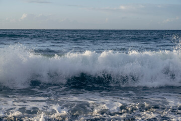 waves breaking on the beach