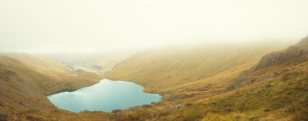 Amazing  view in the national park Lake District in England  on a cloudy sunny  day in Autumn