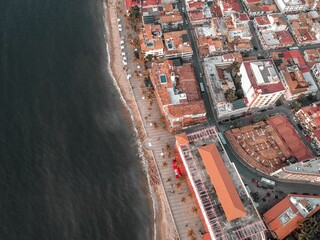 Naklejka premium Aerial shot of Malecon of Puerto Vallarta with some traditional houses and streets