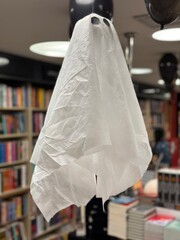 Fototapeta na wymiar ghost in the bookstore on halloween