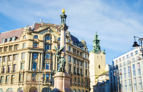 Traditional houses and narrow street in Old town of Lviv, Ukraine. Sunny weather in Lviv