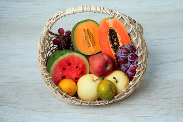 Assorted fresh fruit in basket. Summer fruit set
