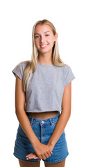 Fototapeta premium Portrait of young beautiful cute girl smiling looking at camera over white background.