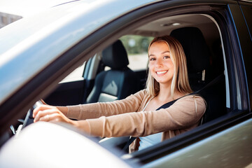 Fototapeta na wymiar car driver woman happy owner of a new car